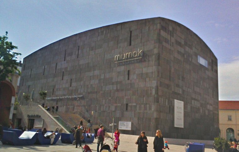 large square building with thin slit windows